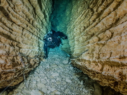 This small cave with clear water has some restrictions wh... by Brenda De Vries 
